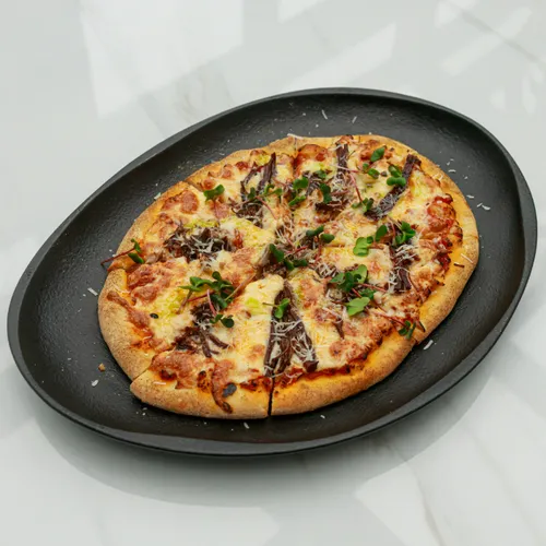 Лепешка с томленной говядиной и овощным соте